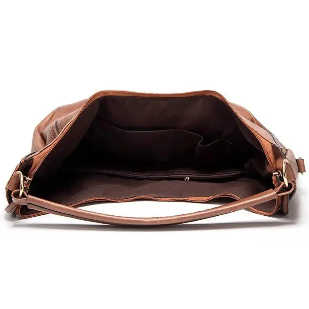 Sienna - Elegant Tassel Hollow Out Shoulder Bag